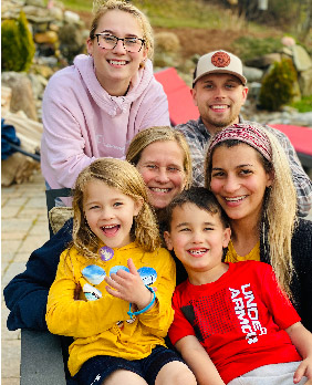 Weisse with siblings Maggie and Tommy, mother Laurie, and children Ryan and Finn, 2019.